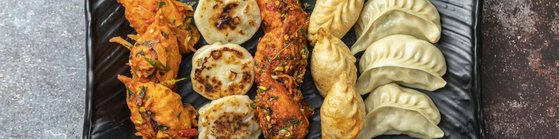 Five different types of dumplings from different Asian countries