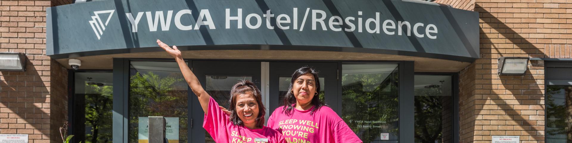 YWCA Hotel staff in front of the YWCA Hotel