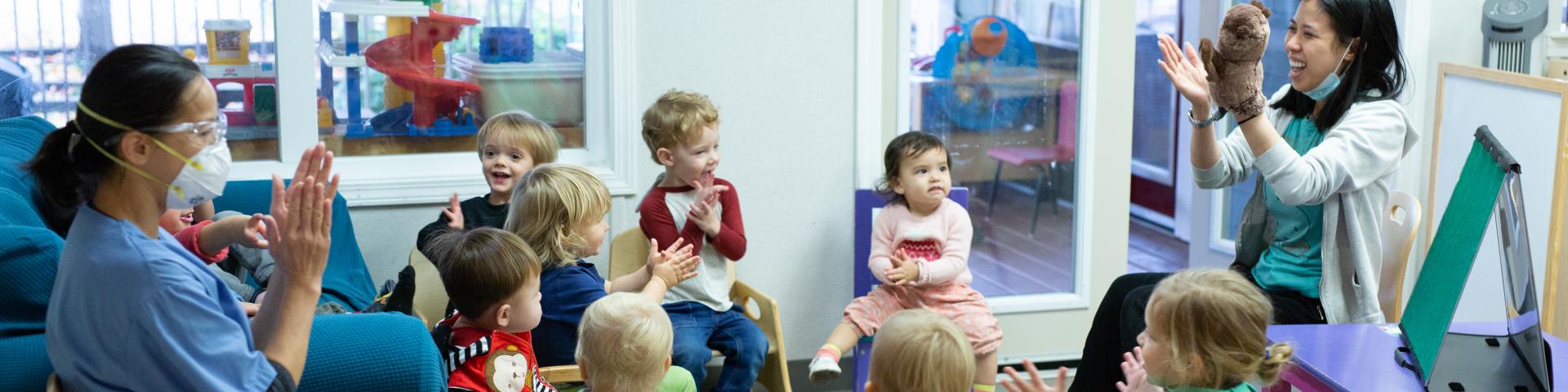 Early Chilhood Educators play with children at YWCA Emma’s Early Learning and Child Care Centre.