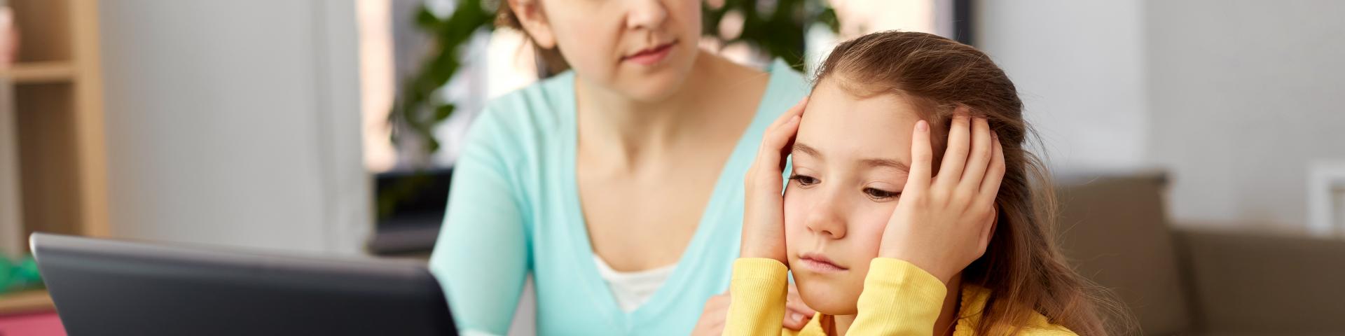 Mom and daughter on the computer