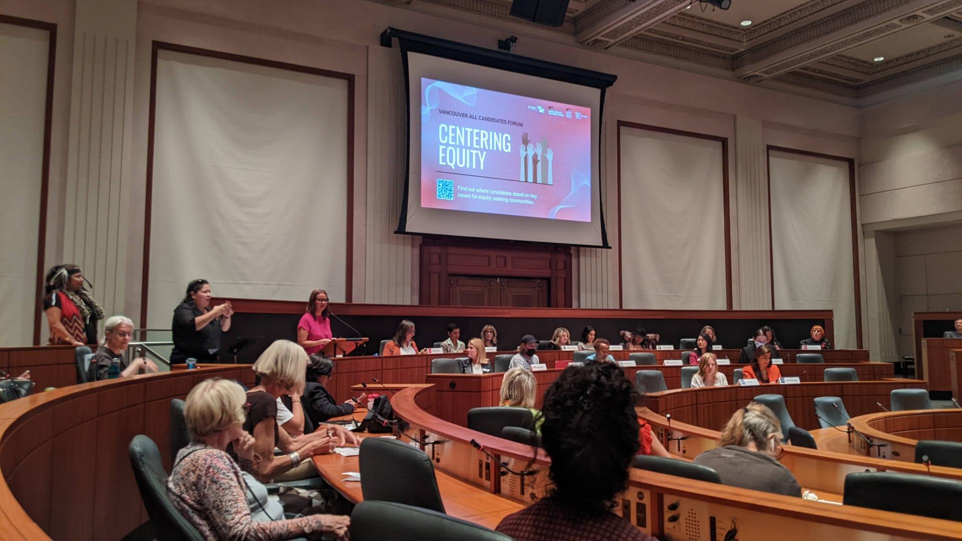 Photo of candidates for the Vancouver local elections 2022 sitting in a circular meeting space at the Centering Equity, All Candidates Forum 
