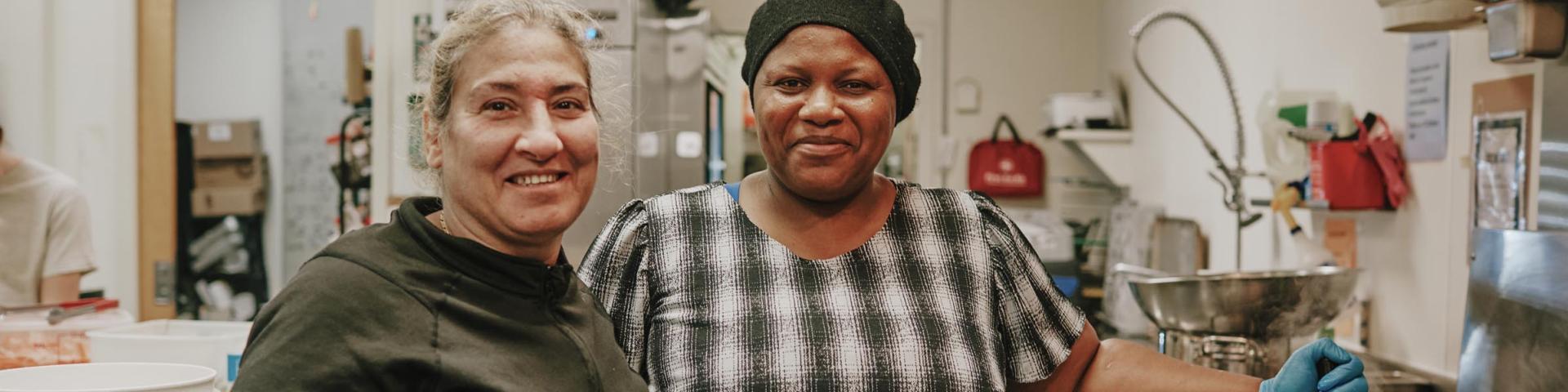 Two volunteers at Crabtree Corner kitchen