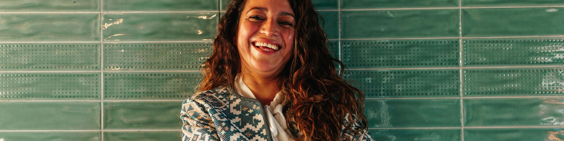 Happy women smiling crossed arms