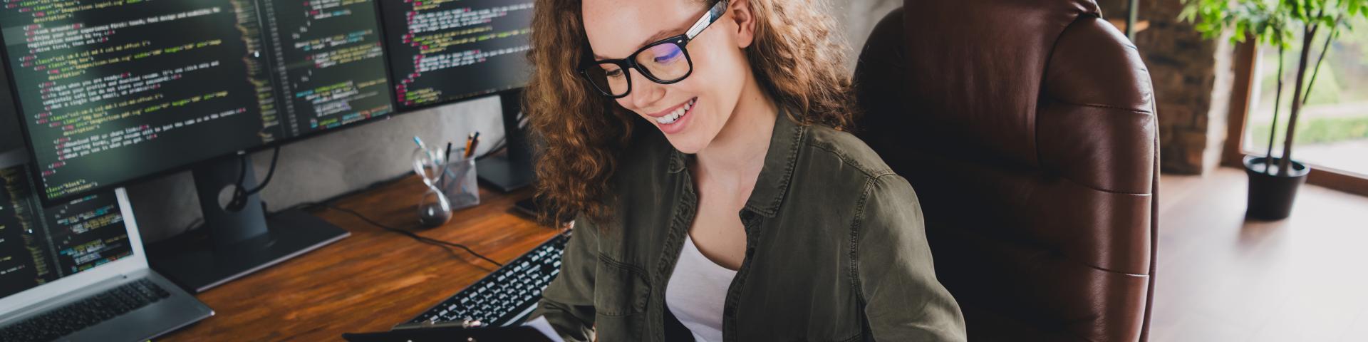 Photo of lovely confident successful woman software developer sitting armchair comfortable workspace workstation indoors
