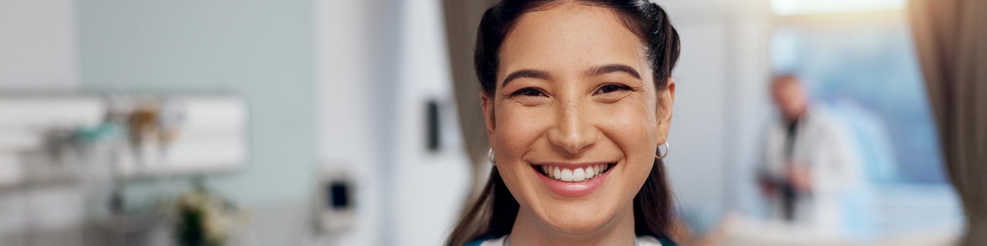 Medical professional smiling at camera