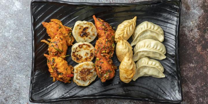 Five different types of dumplings from different Asian countries