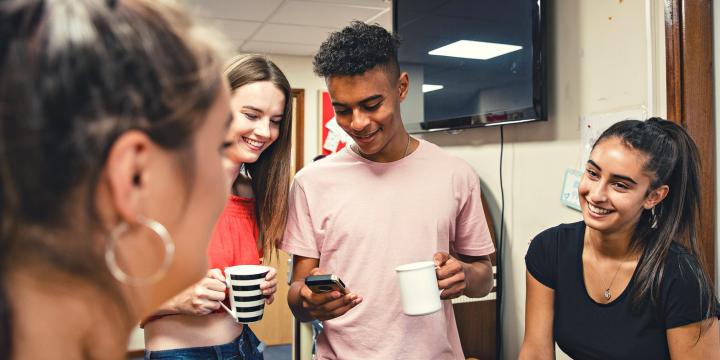 Photo of a diverse group of high school friends together