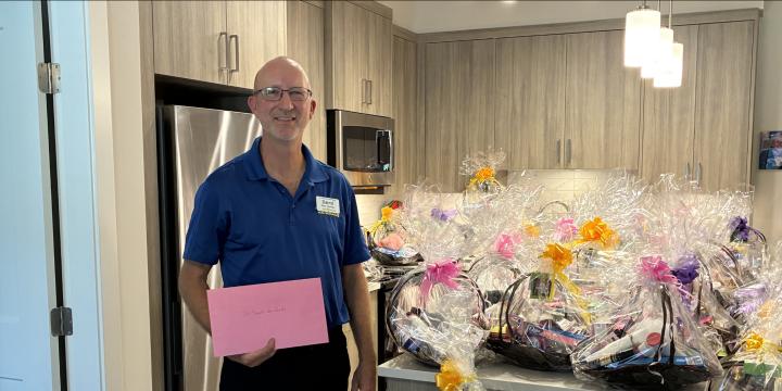 Save-On-Foods manager delivering gift baskets