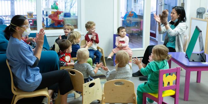 Early Chilhood Educators play with children at YWCA Emma’s Early Learning and Child Care Centre.