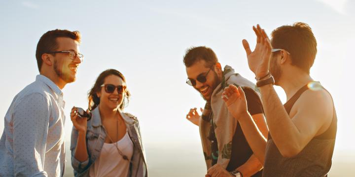 Group of young People Having Fun Together Under the Sun