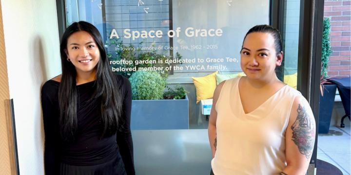 Grace’s daughters, Robbie and Nikki, at the entrance to YWCA Hotel’s A Space for Grace.  