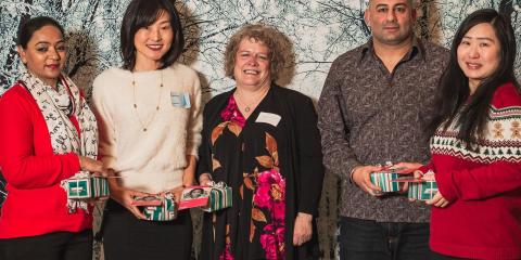YWCA employees receive a gift in recognition of their 10th anniversary with the organization at our Long Service Awards.