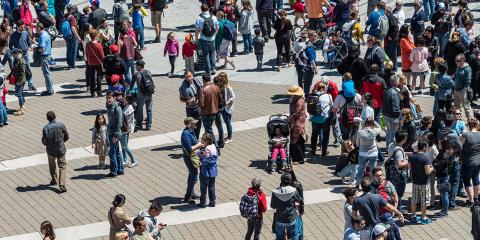 An aerial photo of a crowd of people on a public plaza