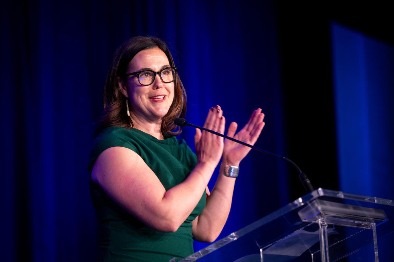 YWCA CEO Erin Seeley Clapping
