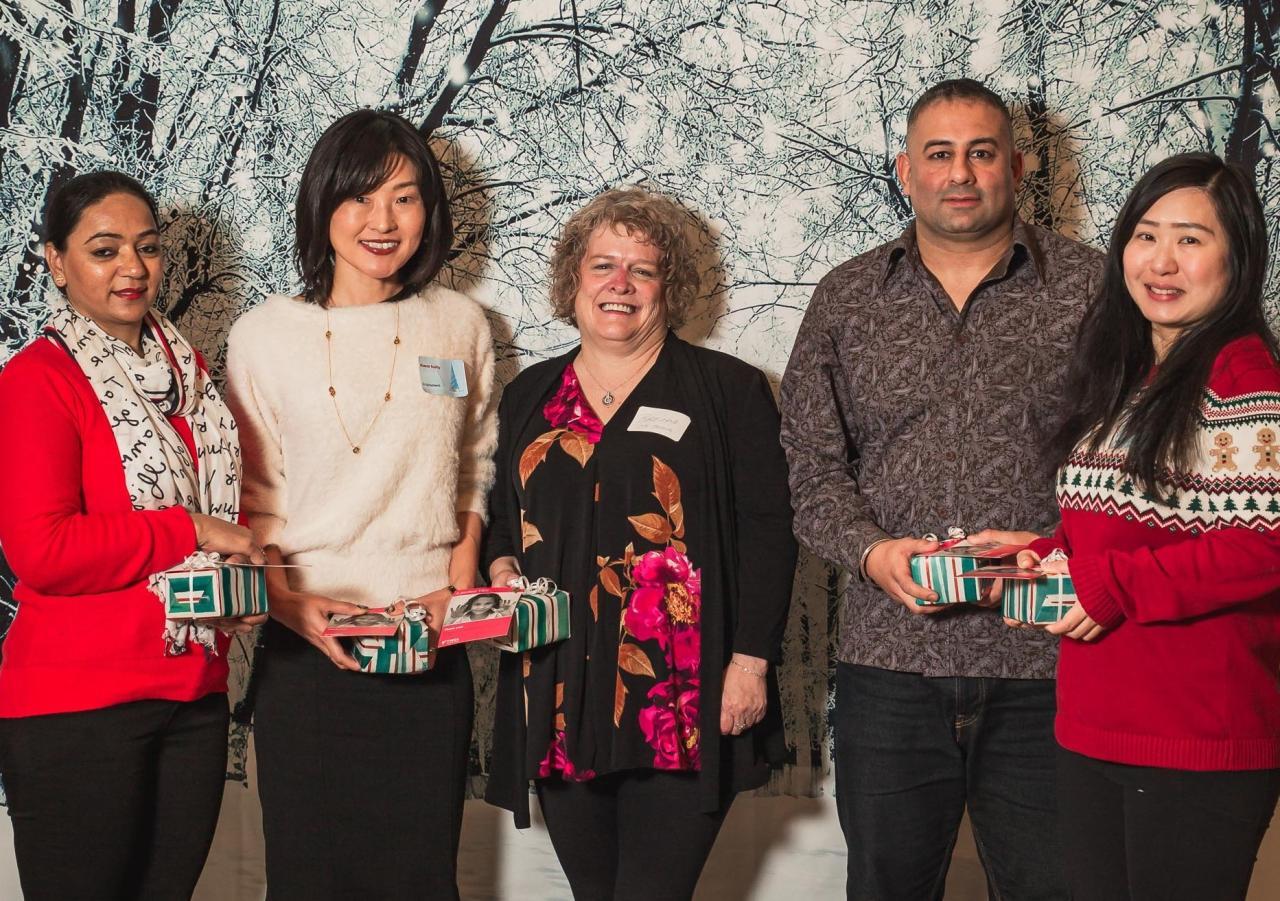 YWCA employees receive a gift in recognition of their 10th anniversary with the organization at our Long Service Awards.