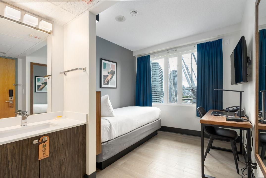 Single bed rooms with hallway bathrooms