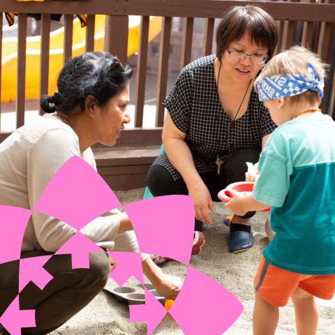 Two adults with a child having playtime outside at YWCA's child care facility.