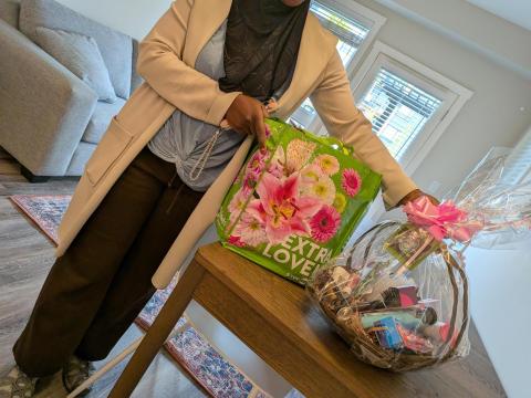 YWCA tenant with gift basket 