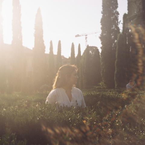 women in bushes