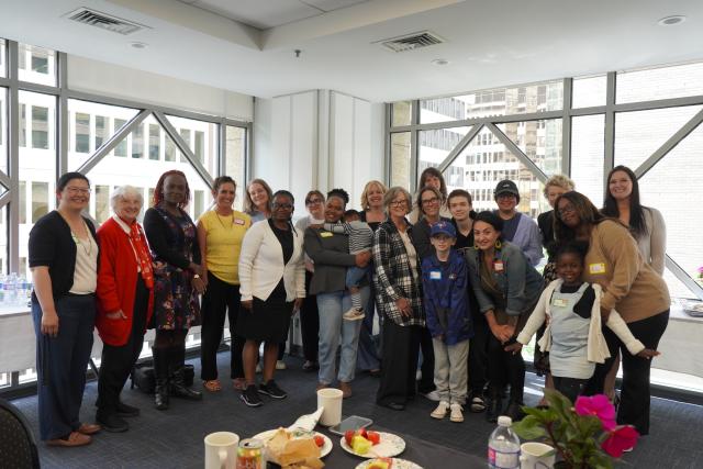 YWCA employees, Scholarship recipients and their families at the YWCA Program Centre to celebrate scholarship recipients.