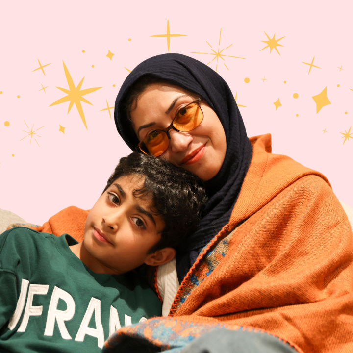 Son leaning on his mother for support